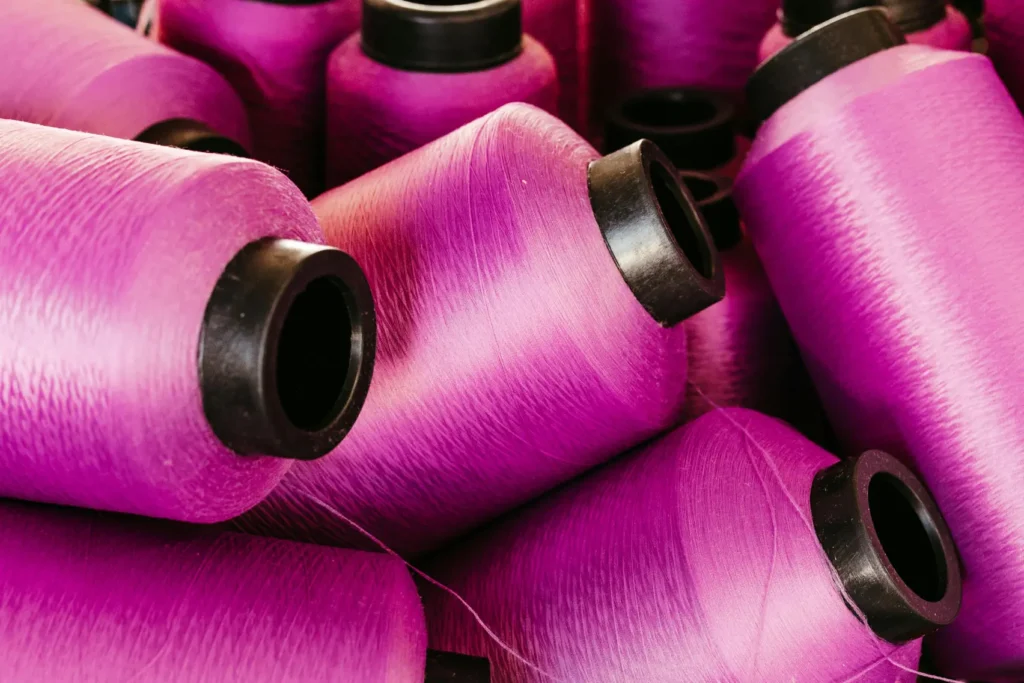 Avoid "High-Shine" Synthetics:
