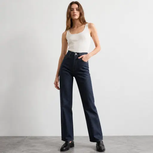 9. The Crisp Button-Down & Leather Midi Statement