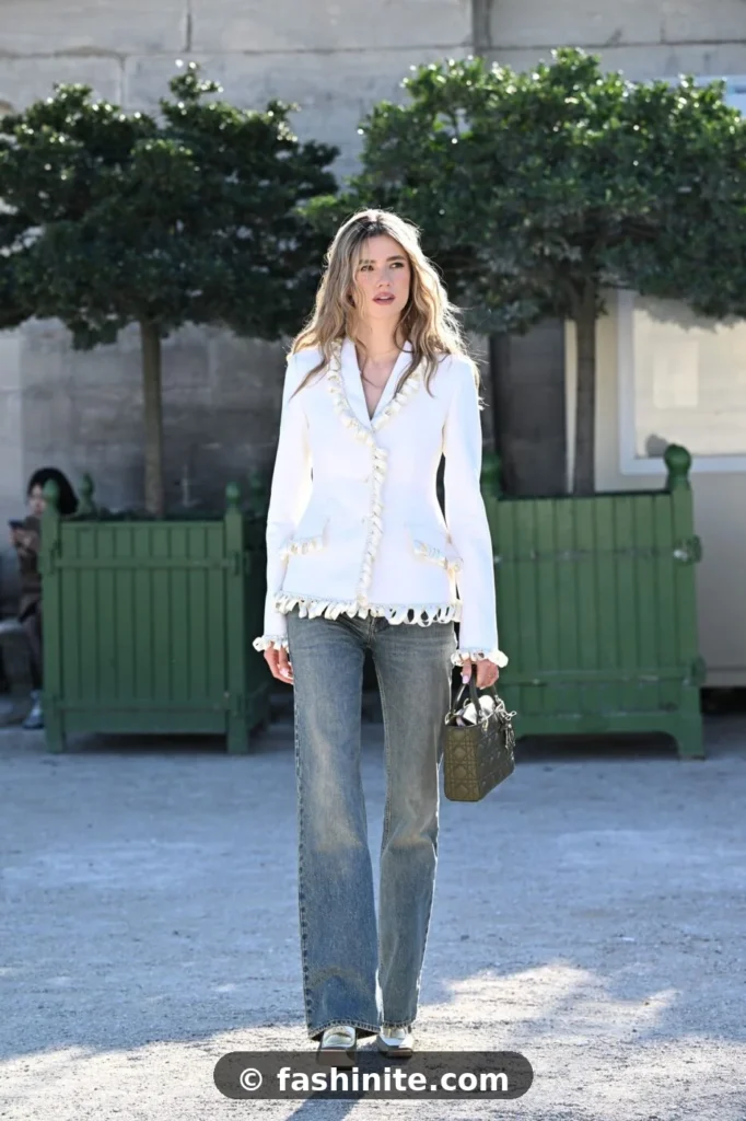 Top Outfits From the Streets of London Fashion Week Relaxed straight-leg jeans with white blazer — street style denim look