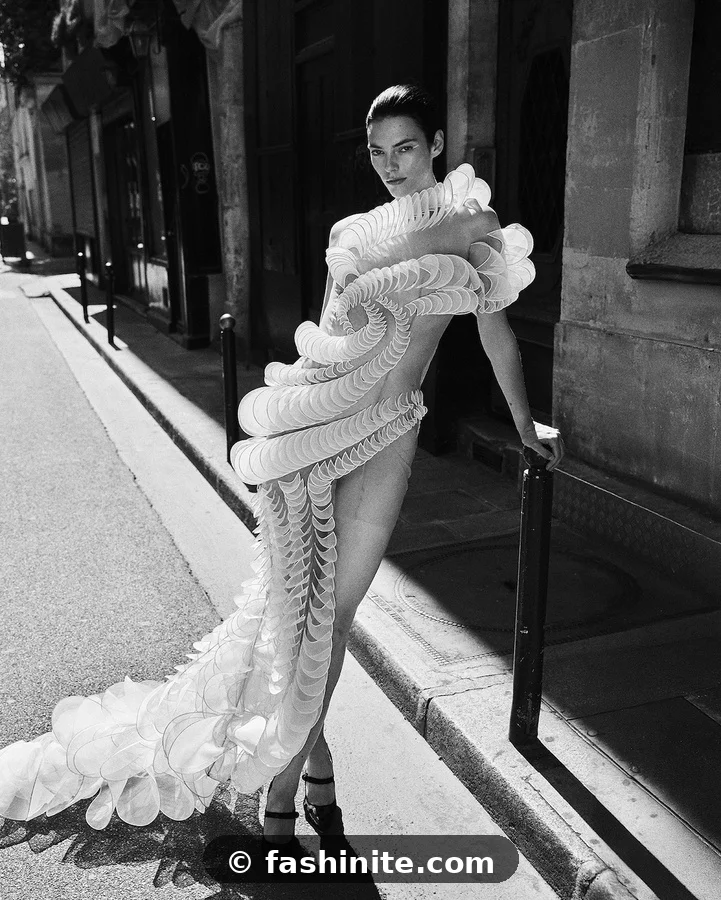 Top Outfits From the Streets of London Fashion Week Avant-garde sculptural ruffled gown worn as street style