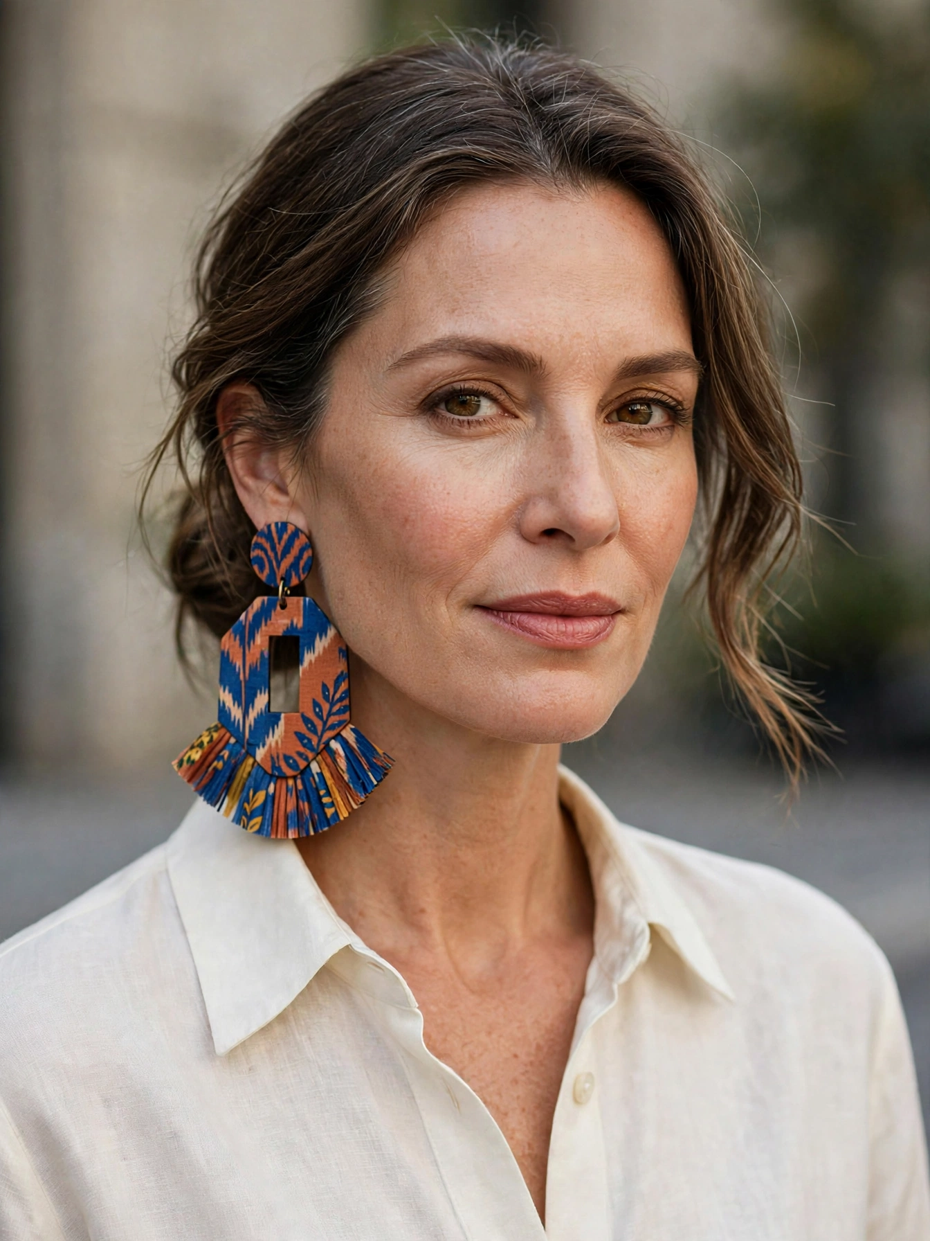 Let one piece shine. If you're wearing a bold print or statement jewelry, keep the rest of the outfit simple. Restraint reads as sophistication.
